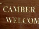 Carved sign inlaid with 23 caret gold leaf - Camber church